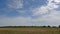 Time lapse of stunning dramatic clouds over a corn field