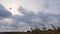 Time lapse of stunning dramatic clouds over a field