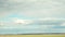 Time-lapse Of Summer Rural Meadow Landscape Under Scenic Sky. Herd Of Cows Grazing In Green Pasture In Rainy Evening