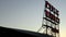 Time lapse of the sun setting behind the public market sign at Pike Place Market, Seattle, Washington, USA