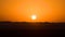 Time lapse of sunrise in desert over sand dunes or plateau. Dawn in UAE, sunup, rising of the sun, morning in desert