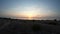 Time lapse of sunrise, sky full of clouds, ocean calm. Larnaca, Cyprus