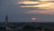 Time lapse of sunset above a small European city