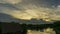 Time lapse sunset behind a moving cloud. Gives a beautiful golden light above the marshes.