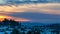 Time lapse of sunset over suburban residential homes in Happy Valley Oregon on a snowy winter evening 4k