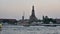 Time lapse of sunset sky with Wat Arun and Chao Phra Ya river (Day to night scene)