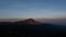 Time lapse of sunset on top of mountain with moving shadow. amazing sunset scenery.