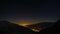 Time lapse of Susa Valley from sunset to night to sunrise, Torino Province, Italy. Mountain ridges and peaks with moving clouds, r