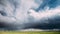 Time Lapse Time-lapse Timelapse Of Countryside Rural Field Spring Meadow Landscape Under Scenic Dramatic Sky Before And
