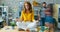 Time lapse of tired office worker relaxing sitting on desk in lotus position