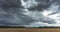 Time lapse of tornado warned splitting supercell storm rolling through the fields in Latvia