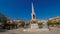 Time lapse of tourists visiting the memorial obelisk dedicated to General Torrijos in Plaza de la Merced