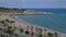 Time lapse of unidentifiable sunbathers at Miracle Beach in Tarragona, Spain on the idyllic Costa Daurada meaning Golden