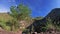 Time lapse view on the crater of Batur volcano, Indonesia. Hiking people along the crater.