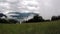 Time lapse of the view of Zell am See and the Zeller See disappears through floating clouds and mist