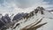 Time lapse of wickedly intense clouds roiling and flowing over peaks