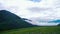 Time lapse of wickedly intense clouds roiling and flowing over peaks