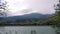 Time lapse of wickedly intense clouds roiling and flowing over peaks