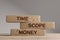Time scope money wooden blocks balance concept