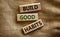 Time to build good habits. Wooden blocks with words `build good habits`. Beautiful canvas background. Copy space. Business and