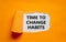 Time to change habits symbol. The text `Time to change habits` appearing behind torn orange paper. Business, growth and time to