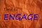 Time to Engage written on wrinkled orange paper