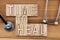 Time to heal- text in vintage letters on wooden blocks with ste
