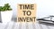 TIME TO INVENT - words from wooden blocks with letters, the time is now concept