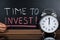 Time To Invest Concept Written On Blackboard