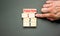 Time to iteration 1 symbol. Concept word Iteration 1 2 3 on wooden block. Businessman hand. Beautiful grey table grey background.