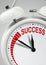Time to success concept, long way to success, clock with inscription