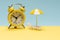Time to travel. Sun lounger, yellow umbrella and alarm clock