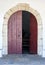 The time traces of past centuries are clearly visible on old wooden door