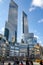 Time Warner Center with people walking in front, New York City, view from low angle
