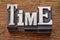 Time word in metal type