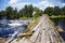 Time worm and damaged by water wooden bridge