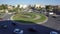Timealpse of cars in a roundabout in a high view