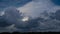 Timelaplse of dark storm clouds motion on evening sky