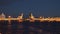 TimeLaps. The ship sails through the drawbridge at night. Saint-Petersburg