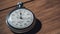 Timelapse of Antique Stopwatch Lies on Wooden Table and Counts the Seconds