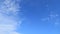 TimeLapse of beautiful sunny blue sky background with white cirrocumulus clouds