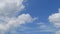 TimeLapse of Beautiful sunny blue sky with puffy fluffy white cumulus or cirrocumulus clouds