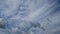 TimeLapse of Beautiful sunny blue sky with puffy fluffy white cumulus or cirrocumulus clouds