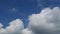 TimeLapse of Beautiful sunny blue sky with puffy fluffy white cumulus or cirrocumulus clouds