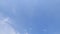 TimeLapse of beautiful sunny clear blue sky with white wispy smoke clouds