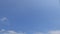 TimeLapse of beautiful sunny clear blue sky with white wispy smoke clouds