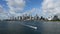 Timelapse of City of Miami on sunny summer day under developing clouds 4K.
