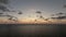 Timelapse Clear bright sunset sky over calm sea. Abstract aerial nature summer ocean sunset, sea and sky view. Vacation