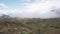 Timelapse of clouds approaching the camera over the valley.