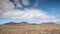 Timelapse of clouds over desert Timanfaya National Park.